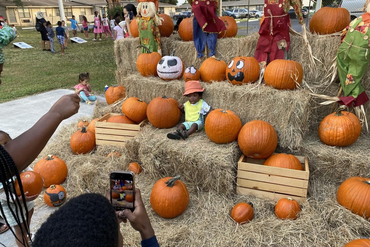 Baby in a Pumpkin Patch