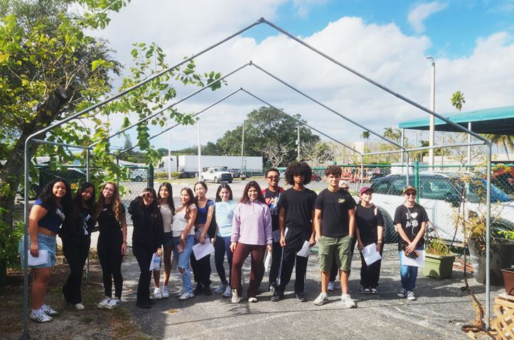 Garden Volunteers Under Canopy